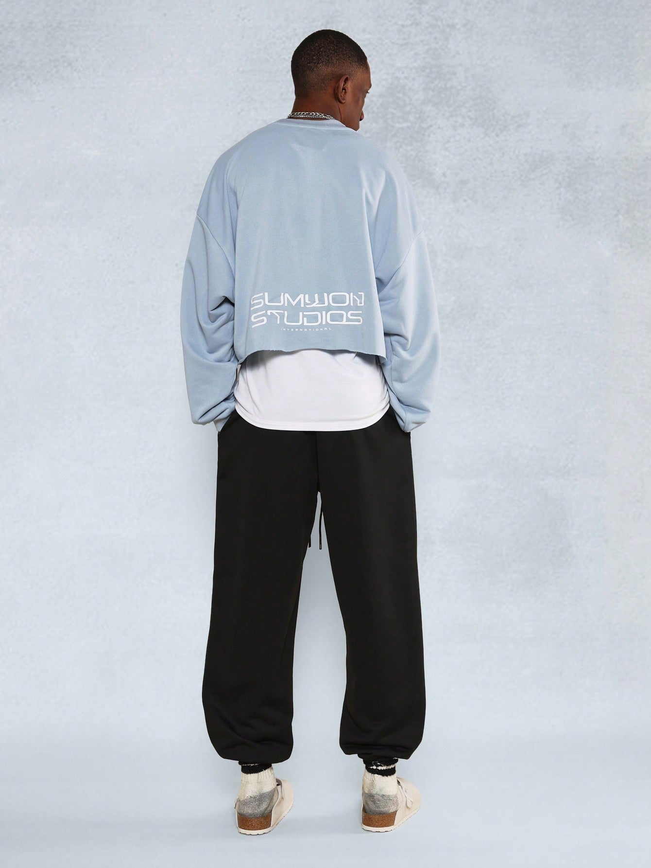 SUMWON Cropped Long Sleeve Raw Edge Sweatshirt With Small Embroidery And 90's Jogger 2 Piece Set