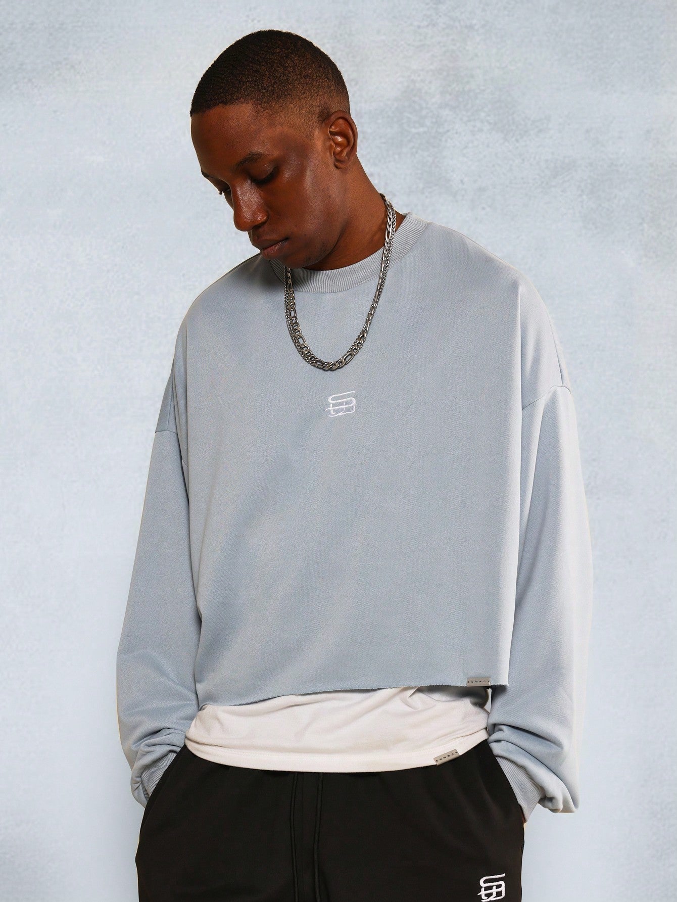 SUMWON Cropped Long Sleeve Raw Edge Sweatshirt With Small Embroidery And 90's Jogger 2 Piece Set