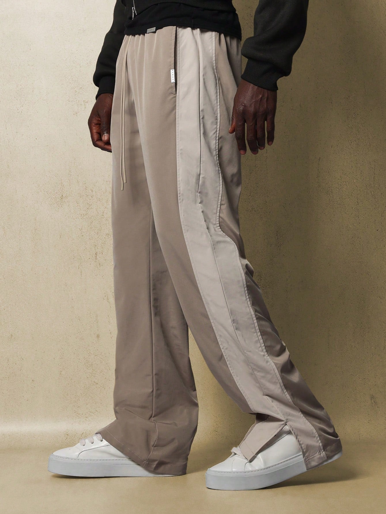 SUMWON Flare Fit Contrast Panel Nylon Pant With Split Hem